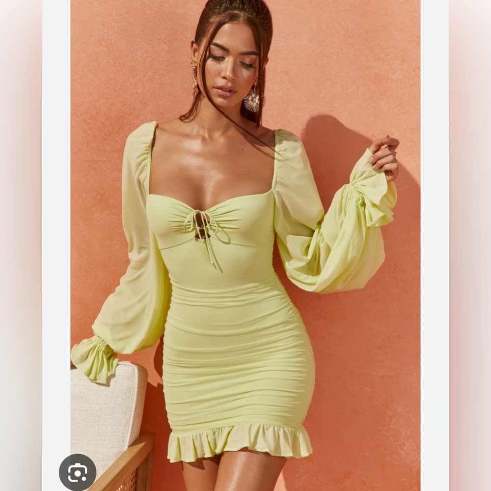 Oh Polly time to escape mesh style mini dress in pastel green. Size 6.